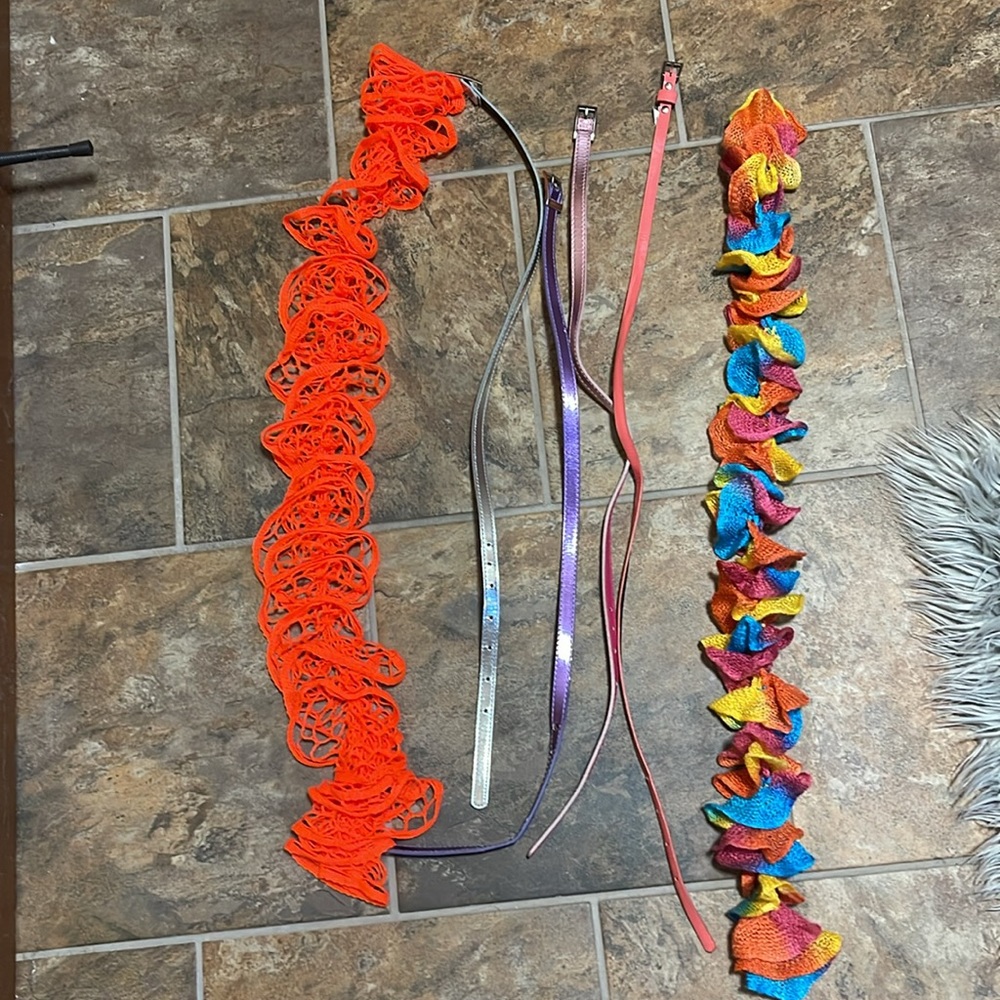 4 kids belts and 2 scarves.